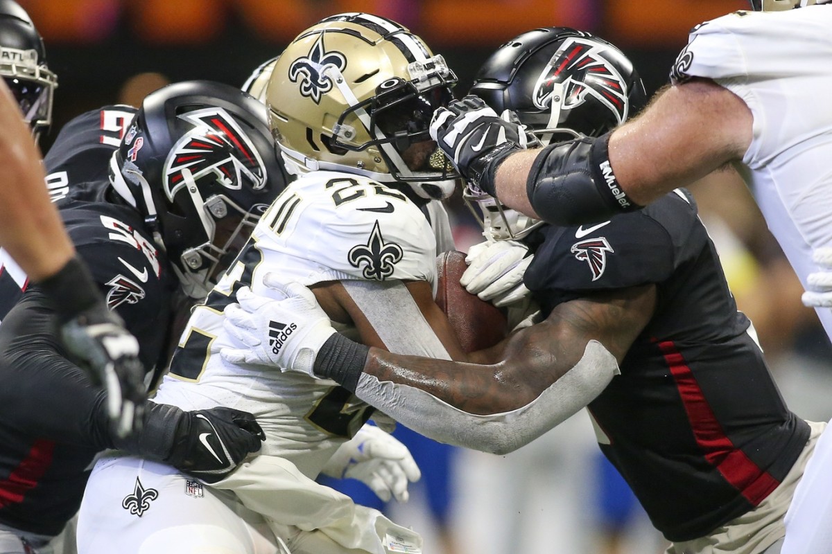 New Orleans Saints running back Mark Ingram II (22) is tackled by Atlanta Falcons linebacker Mykal Walker (3). Mandatory Credit: Brett Davis-USA TODAY Sports